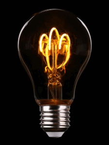 flickering light bulb with dark background