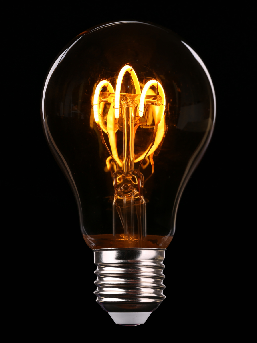 flickering light bulb with dark background