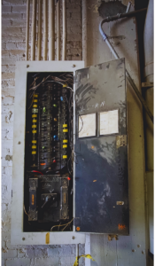 Old overloaded electrical panel in Daytona, FL home