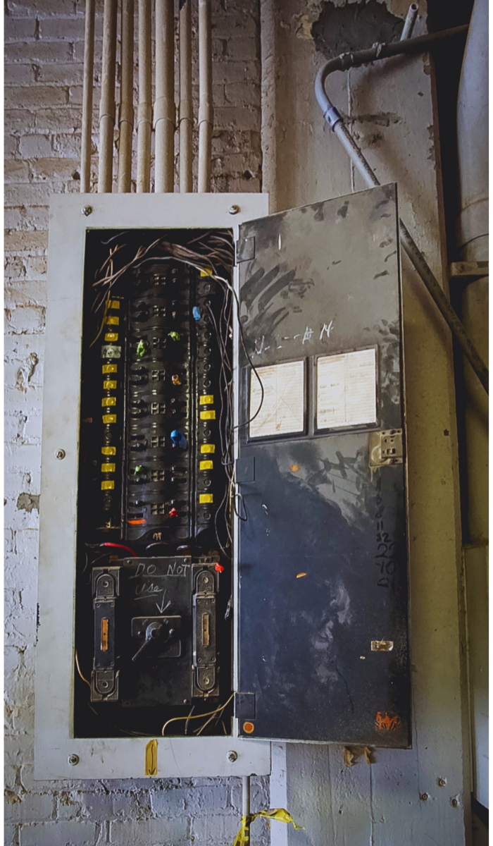 Old overloaded electrical panel in Daytona, FL home